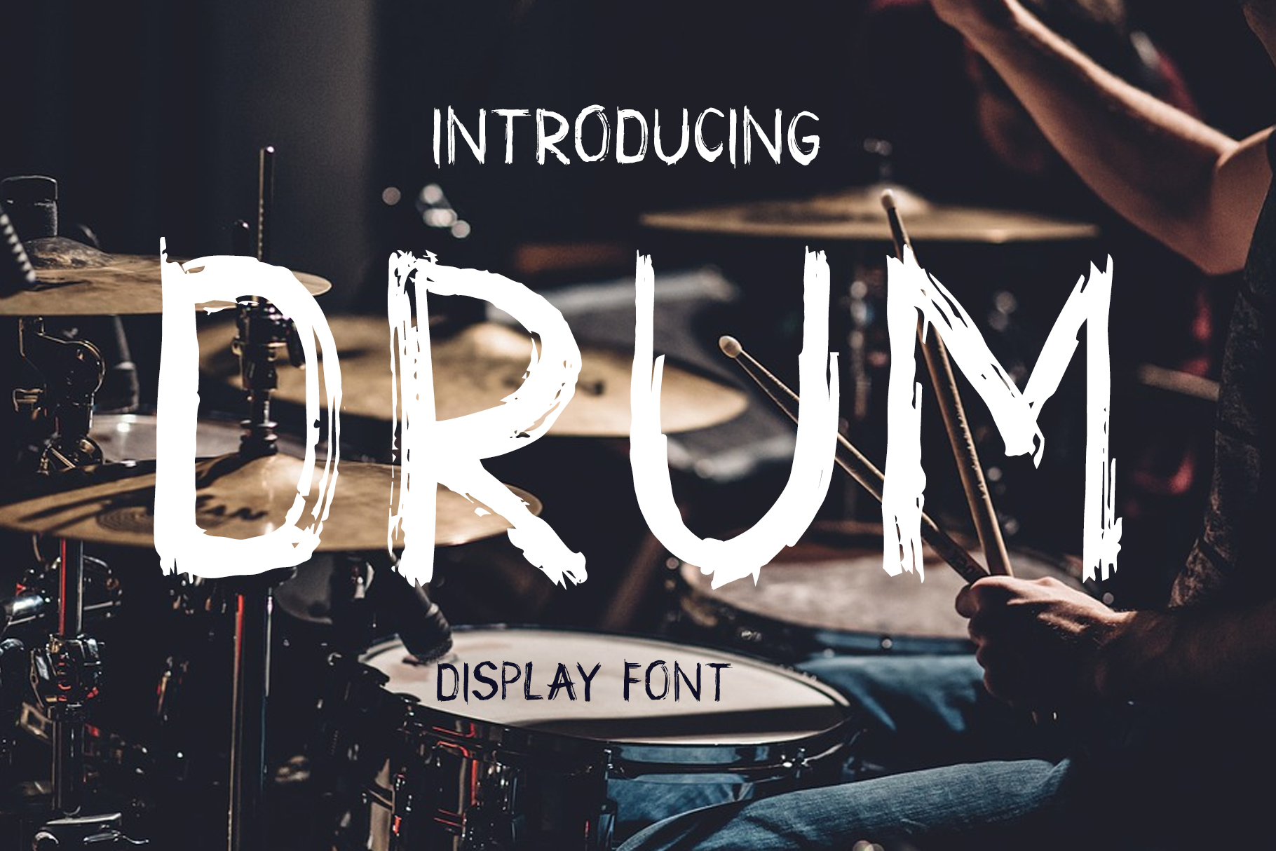 Drum Font Review: A Grunge Display Typeface for Bold Branding
